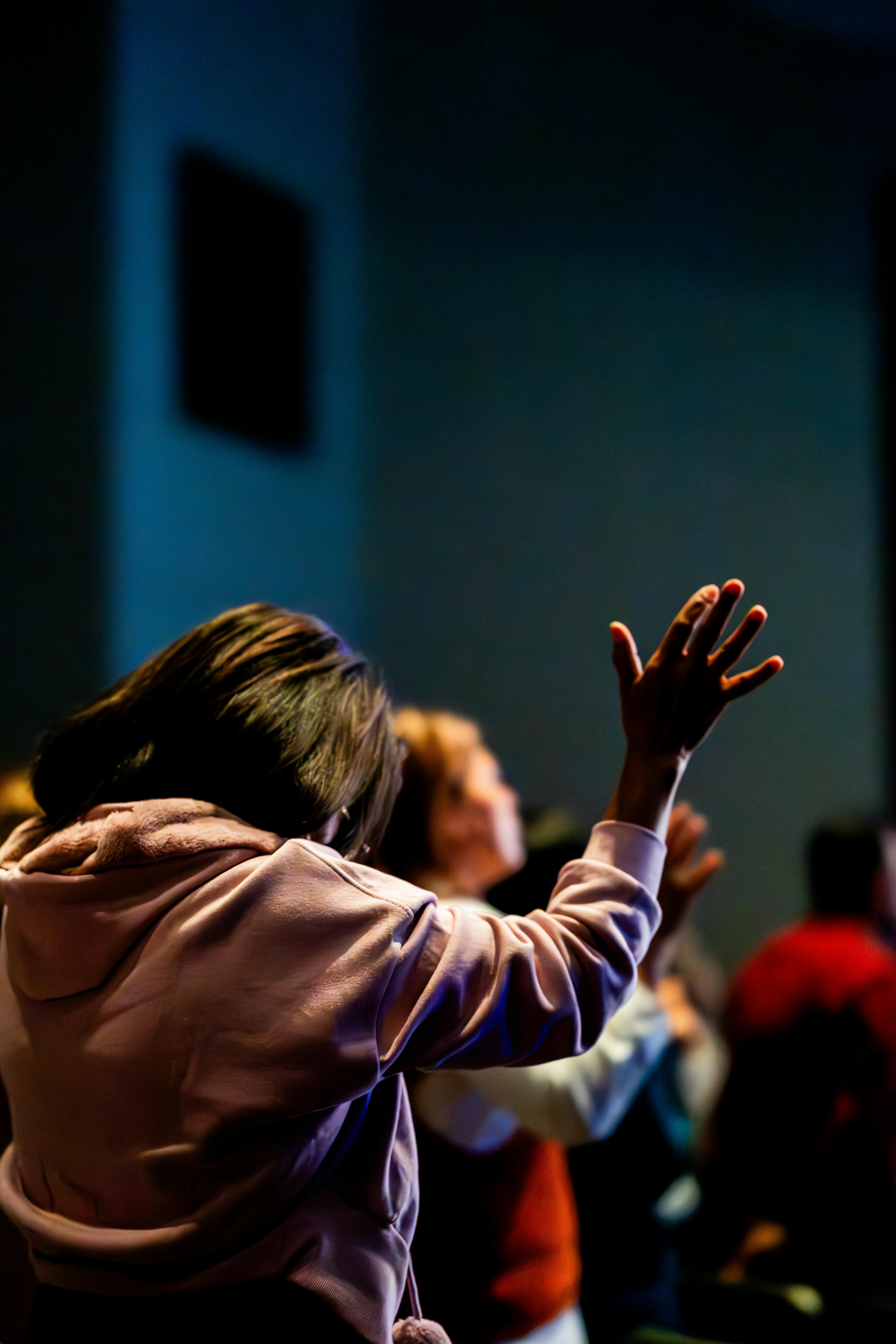 Hands raised in worship